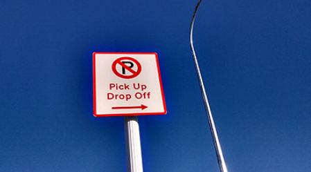 Pick up drop off signs in PUDO