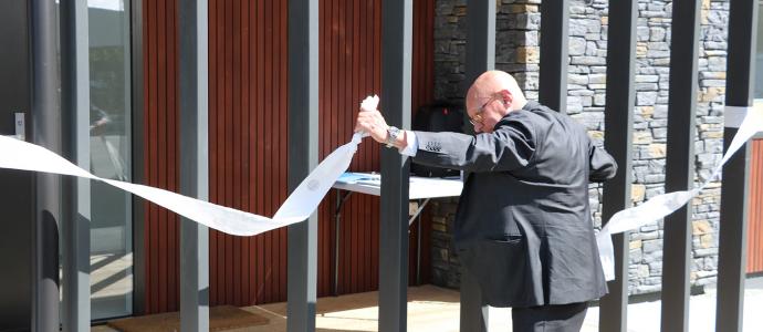 Mayor Jim Boult cuts the tape to open Project Shotover